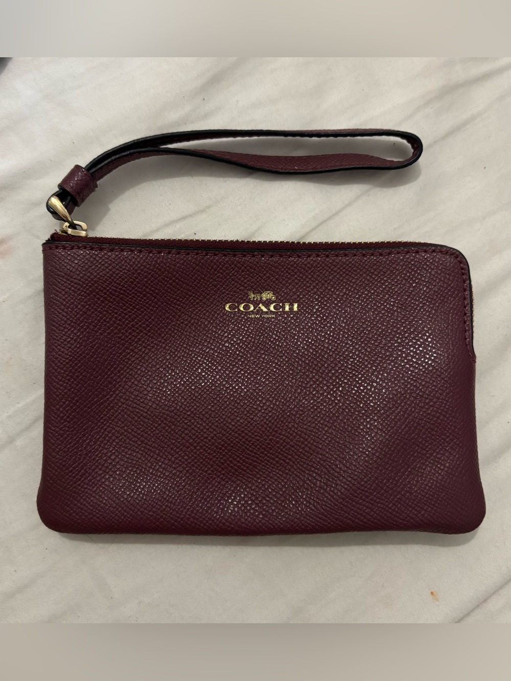 Coach Burgundy Leather Wristlet with Gold Logo